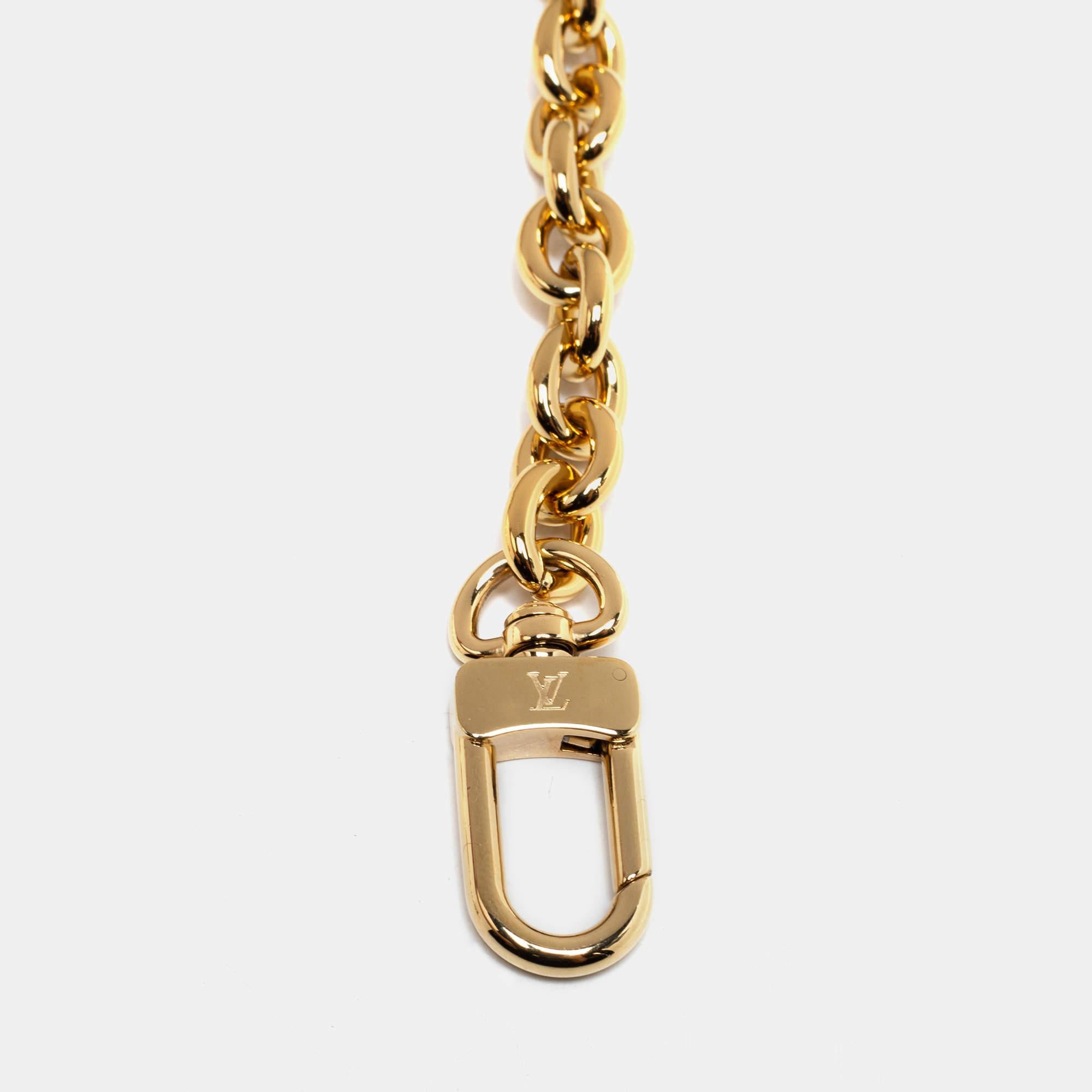 Chain link straps are so trendy now, and what is better than one from the house of Louis Vuitton! This version is crafted using gold-tone metal and comes attached with two clasps to attach to your bags.


