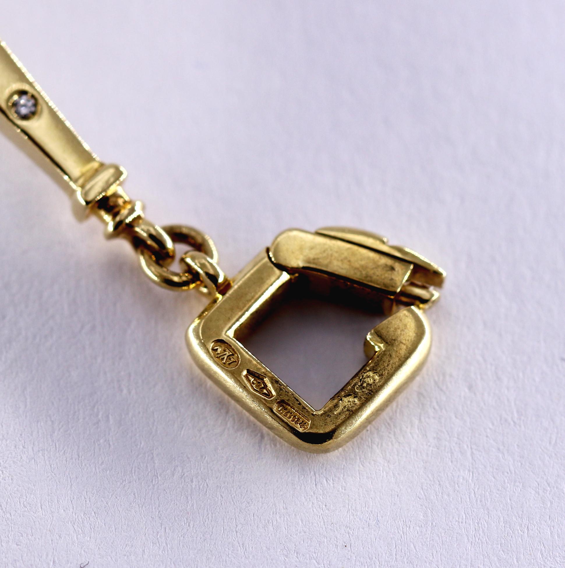 Women's Louis Vuitton Gold Charm Bracelet with Lock and Key Clasp and Eiffel Tower Charm