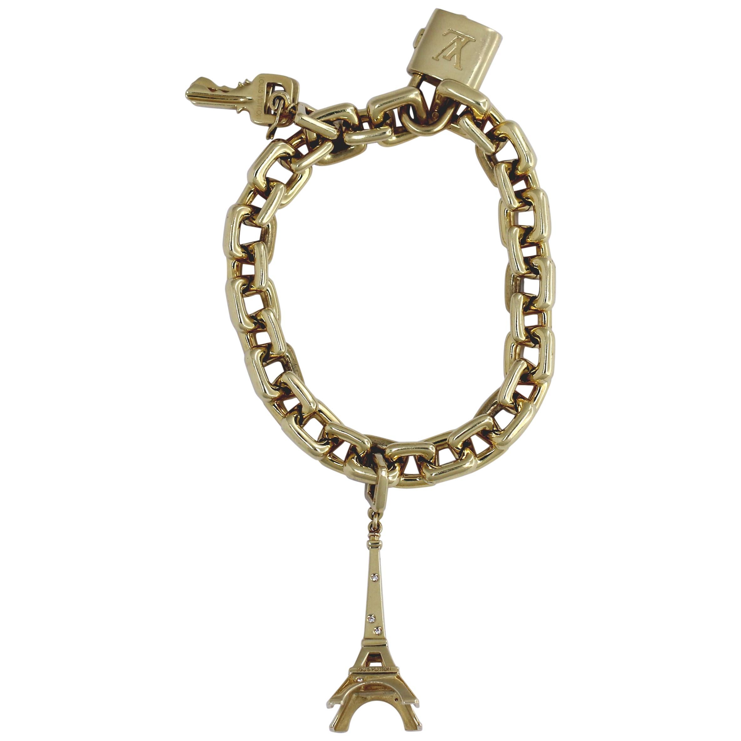 Louis Vuitton Gold Charm Bracelet with Lock and Key Clasp and Eiffel Tower Charm