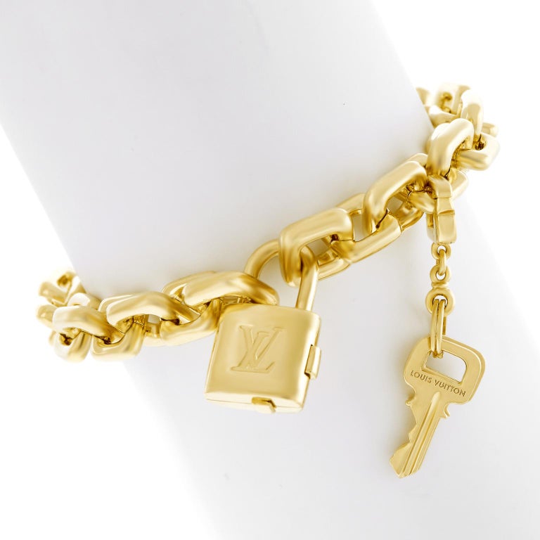 Louis Vuitton Gold Charm Bracelet with Lock and Keys at 1stDibs