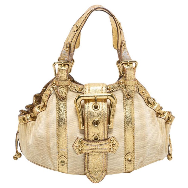 Louis Vuitton Gold/Cream Canvas and Leather Antigua Theda PM Bag at 1stDibs
