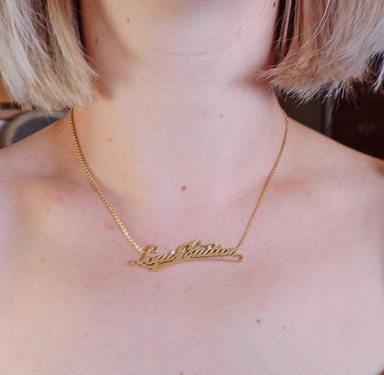 Louis Vuitton Gold Diamond Logo Pendant Necklace For Sale at 1stdibs