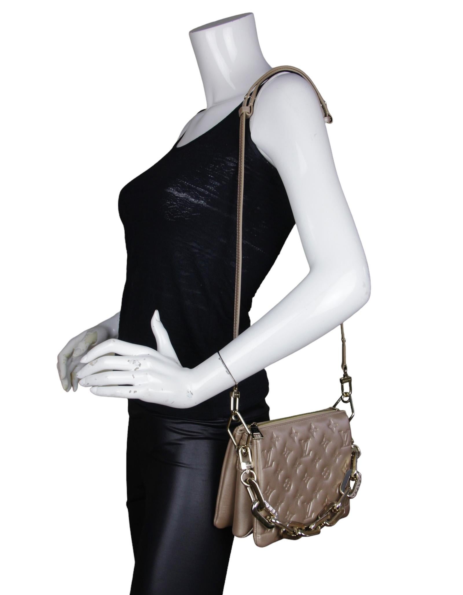 Louis Vuitton Gold Embossed Monogram Coussin BB Crossbody Bag.  Features adjustable strap allowing for crossbody or shoulder carry, and chain strap for baguette and under-arm carry.

Made In: Italy
Color: Gold
Hardware: Goldtone
Materials: Lambskin