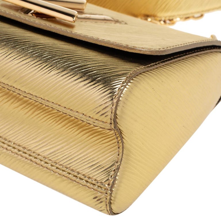 Louis Vuitton Metallic Gold Epi Leather Twist PM Bag at 1stDibs