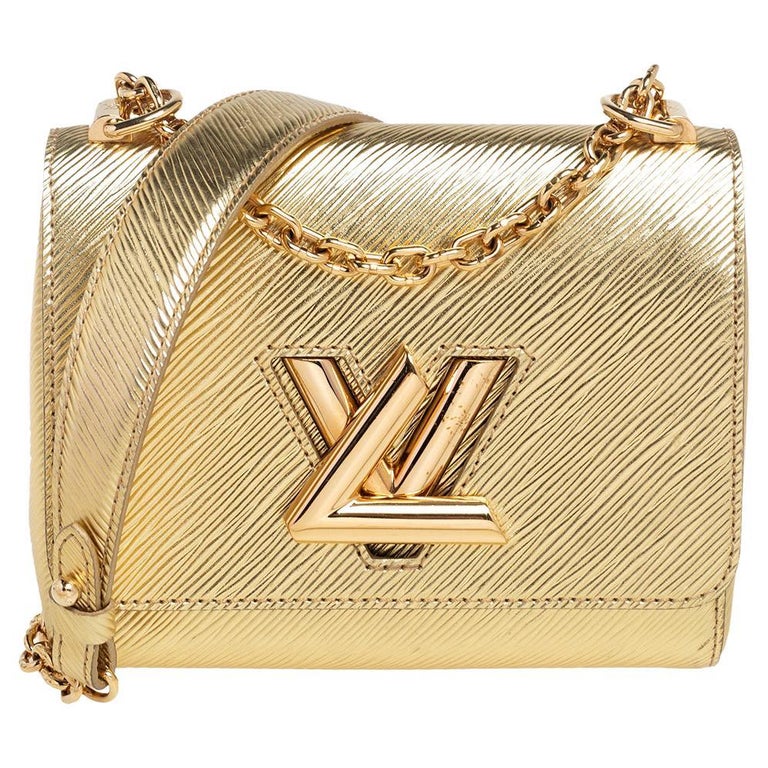elegant louis vuitton gold handbag