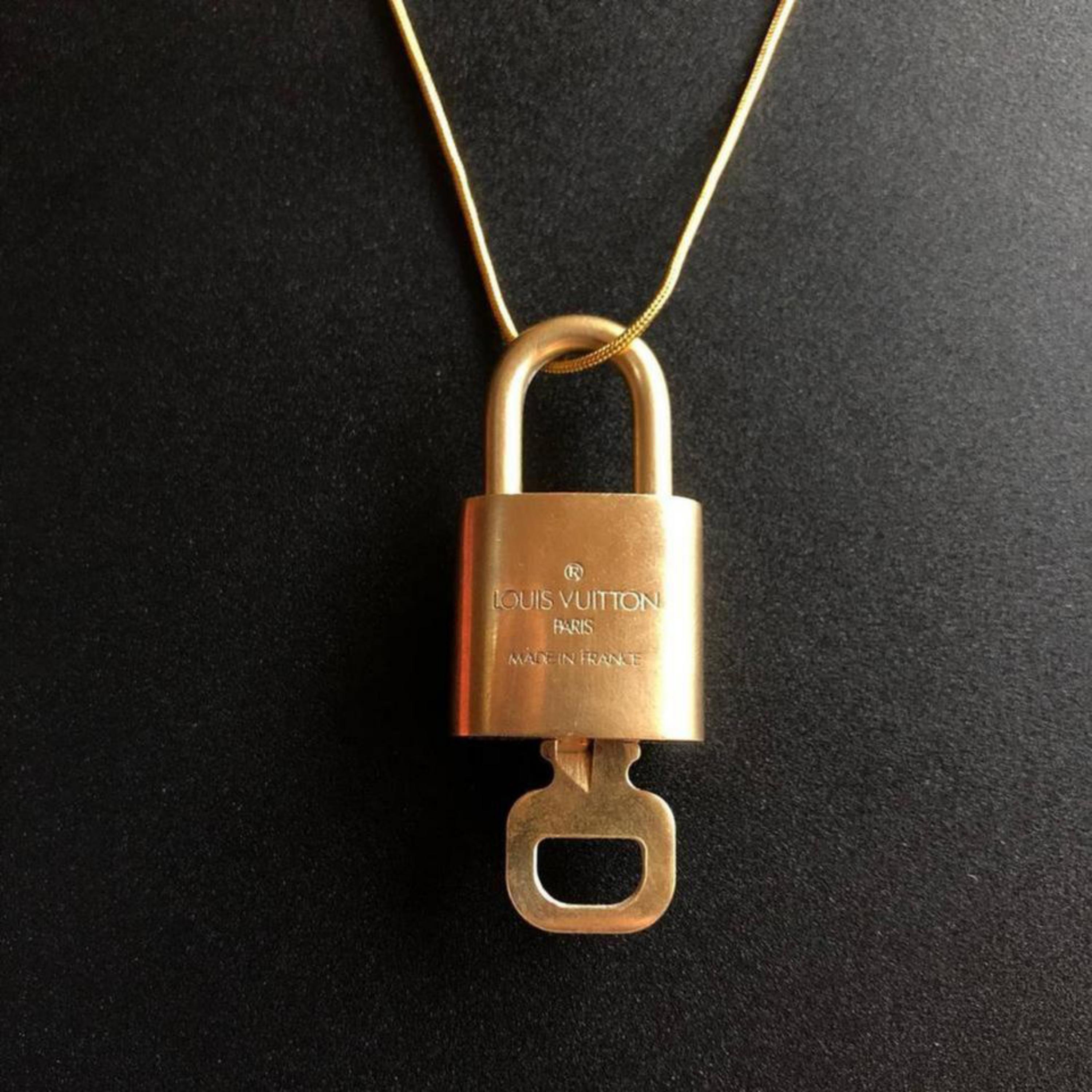 Louis Vuitton Gold Gold Single Key Lock Pad Lock and Key 867741 For Sale 8