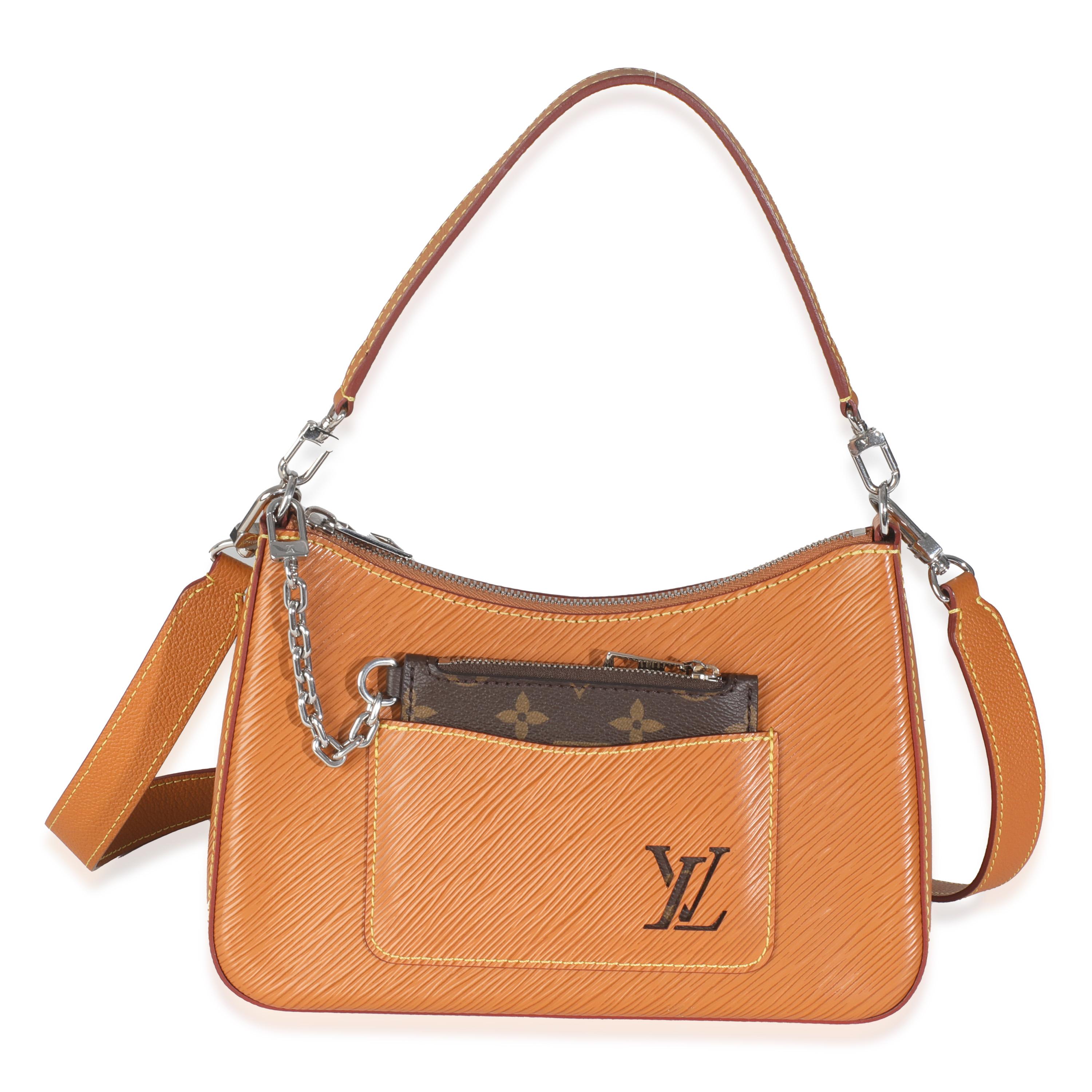 Listing Title: Louis Vuitton Gold Honey Epi Marelle
SKU: 145779
MSRP: 2510.00 USD
Condition: Pre-owned 
Handbag Condition: Excellent
Condition Comments: Item is in excellent condition and displays light signs of wear.  Minor wear along interior.