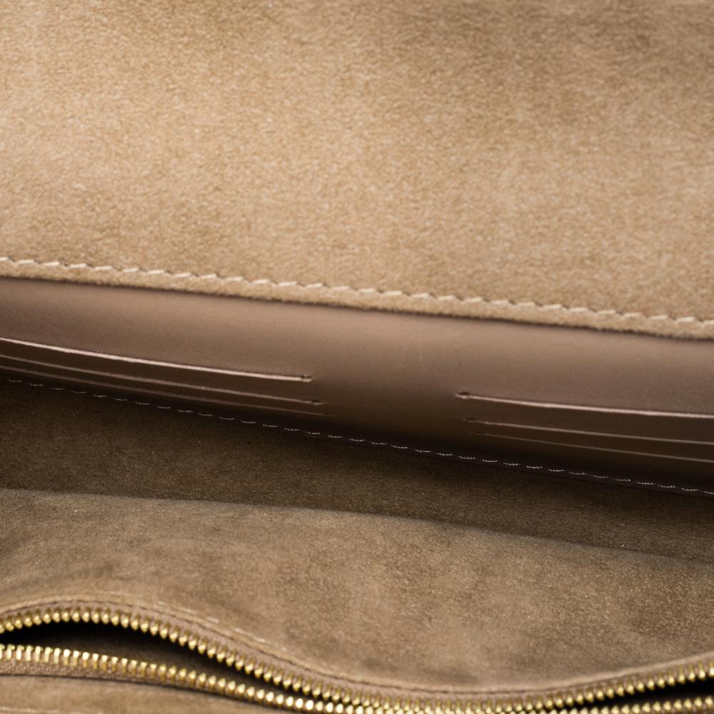 Louis Vuitton Louise Clutch aus goldenem Leder 5