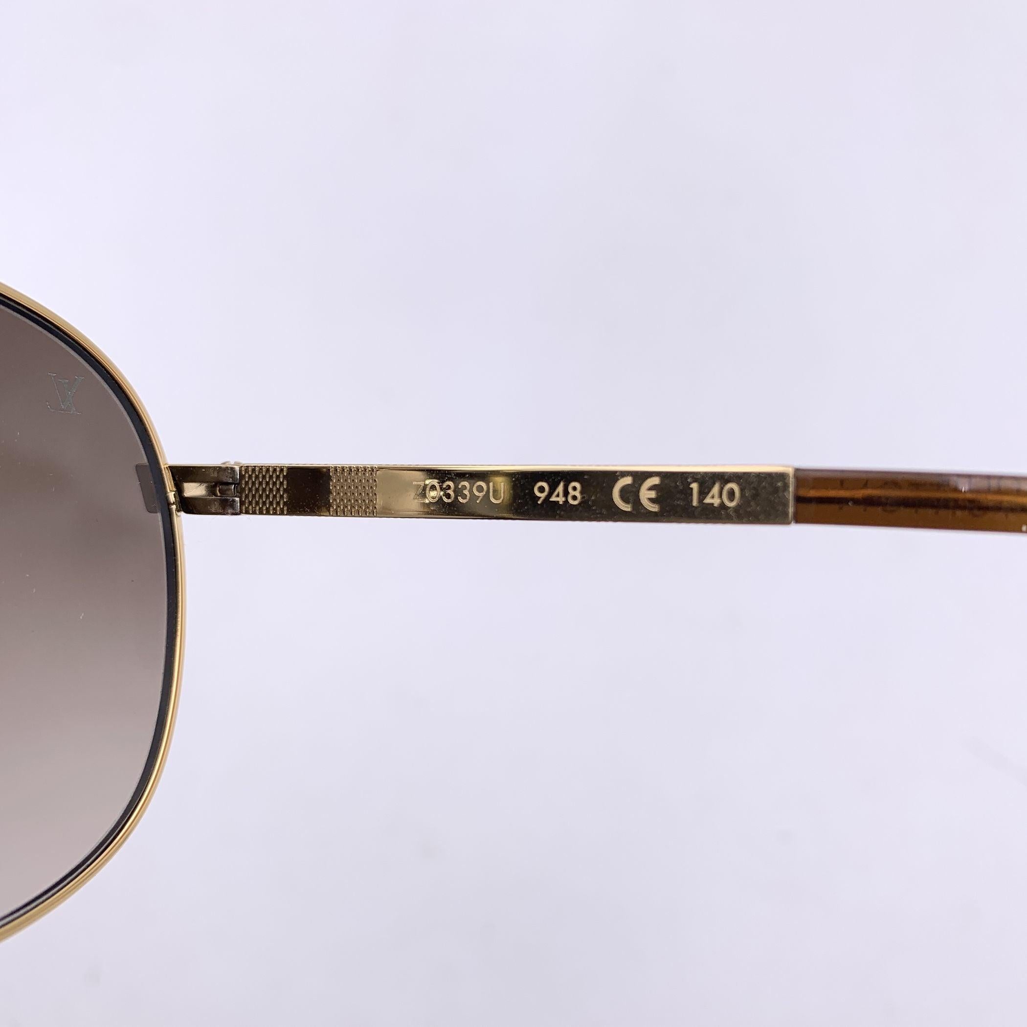Women's Louis Vuitton Gold Metal Altitude Aviator Z0339U Sunglasses 61/14