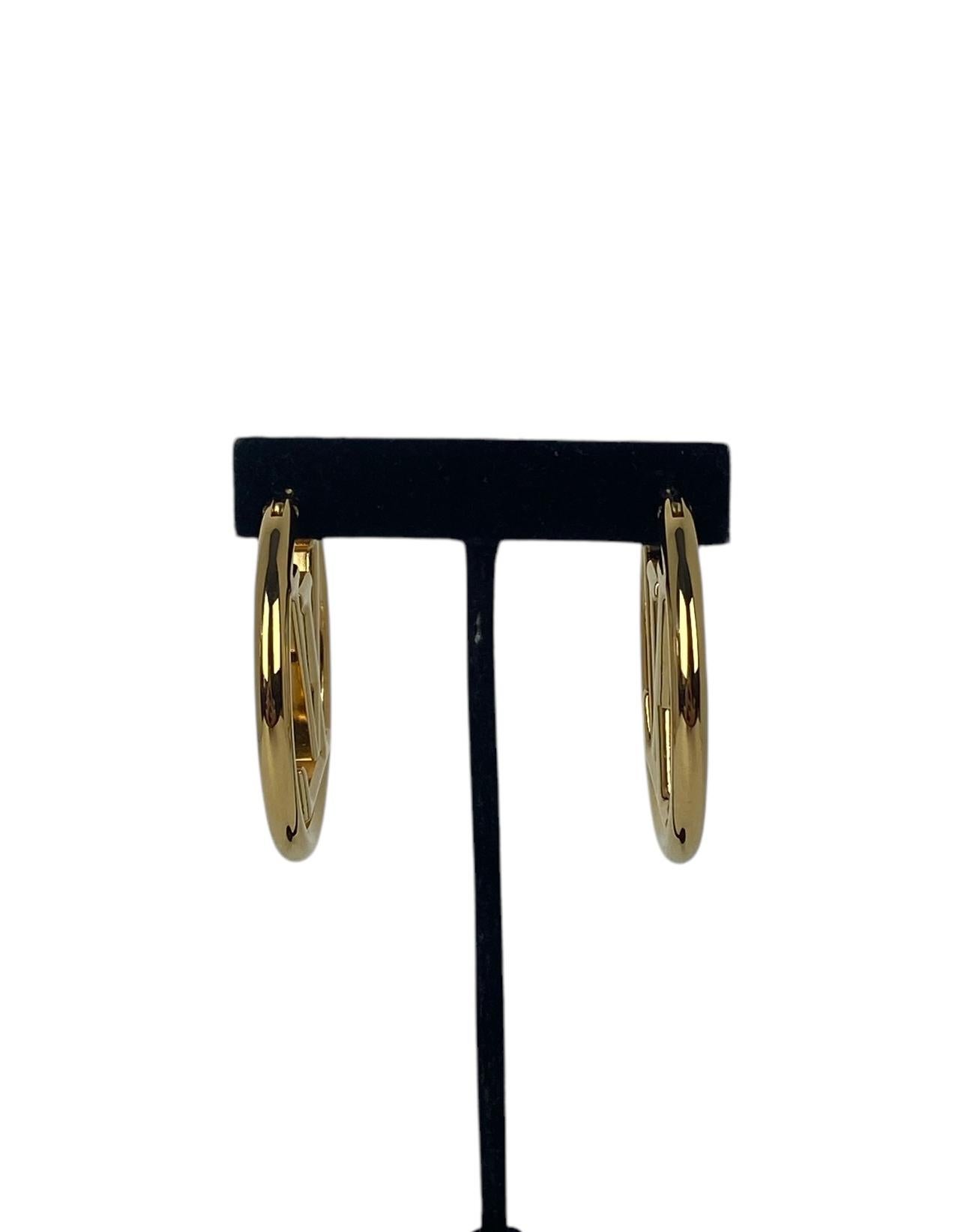 Louis Vuitton - Créoles Louise en métal doré Excellent état - En vente à New York, NY