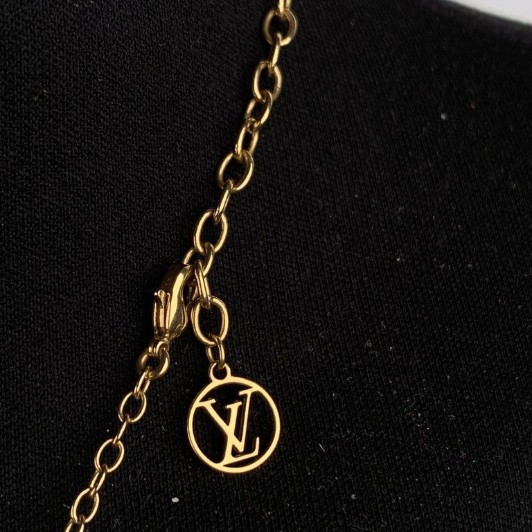 Louis Vuitton Gold Metal Love Lock Pendant Necklace For Sale at