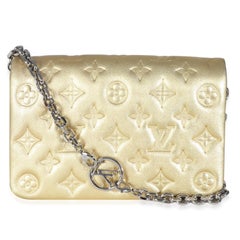 Louis Vuitton Gold Metallic Lambskin Embossed Monogram Pochette Coussin