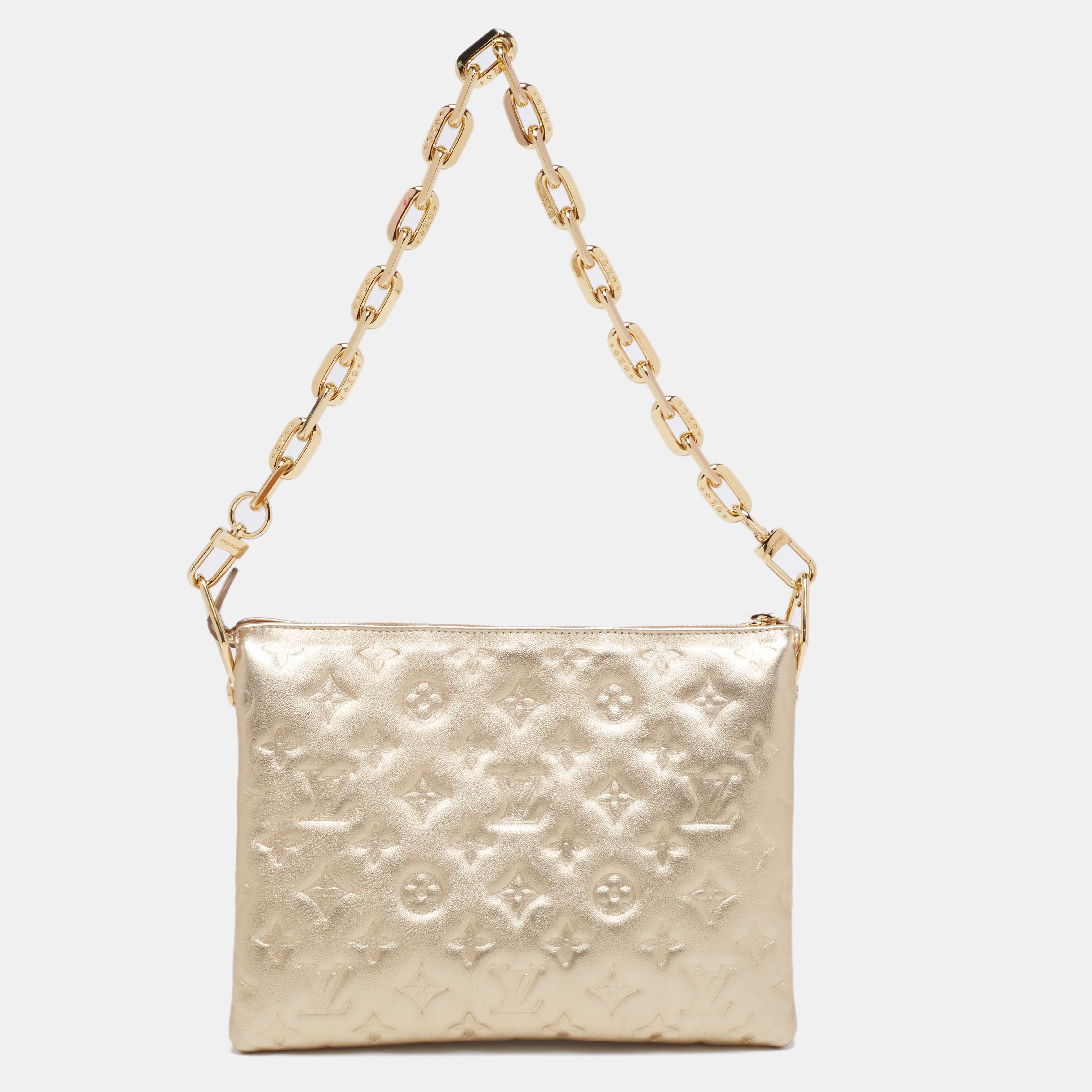 Made skillfully from monogram embossed leather, this Louis Vuitton bag is super-chic and versatile. The stunning gold-hued bag comes with a chain and shoulder strap and flaunts a structured shape. It is the perfect evening accessory to add to your