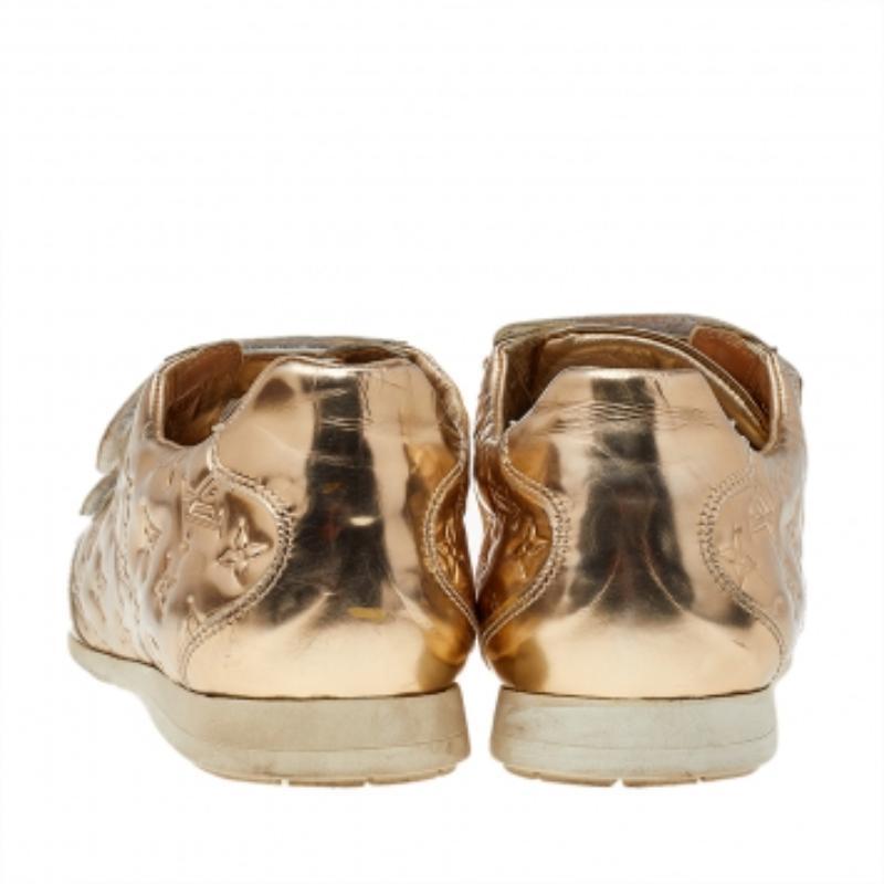 Louis Vuitton Gold Monogram Empreinte Leather Low Top Sneakers Size 38.5 In Good Condition In Dubai, Al Qouz 2