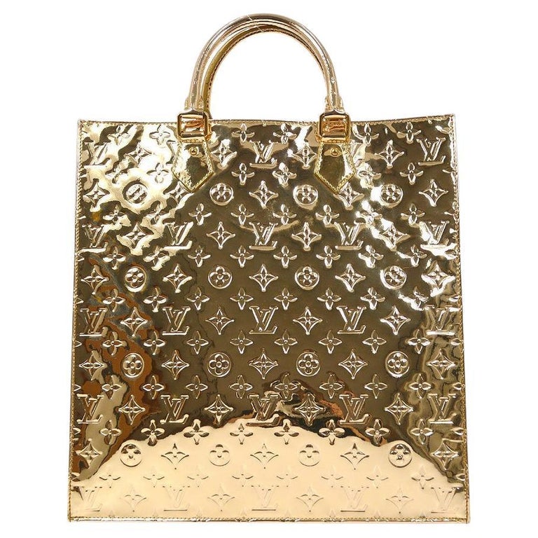 LOUIS VUITTON Gold Monogram Mirror Gold Hardware Top Handle Travel Tote Bag  For Sale at 1stDibs