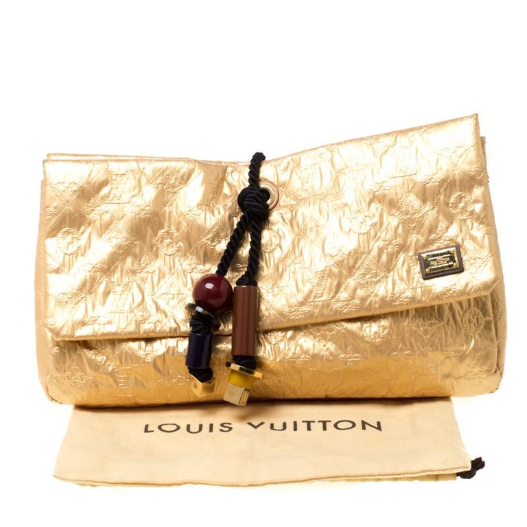 Auth LOUIS VUITTON Limelight Clutch Second Hand Bag Gold Leather