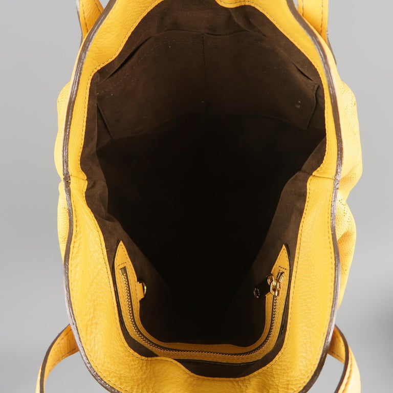 LOUIS VUITTON Gold Perforated Monogram Leather Mahina Cirrus PM Handbag For Sale at 1stdibs