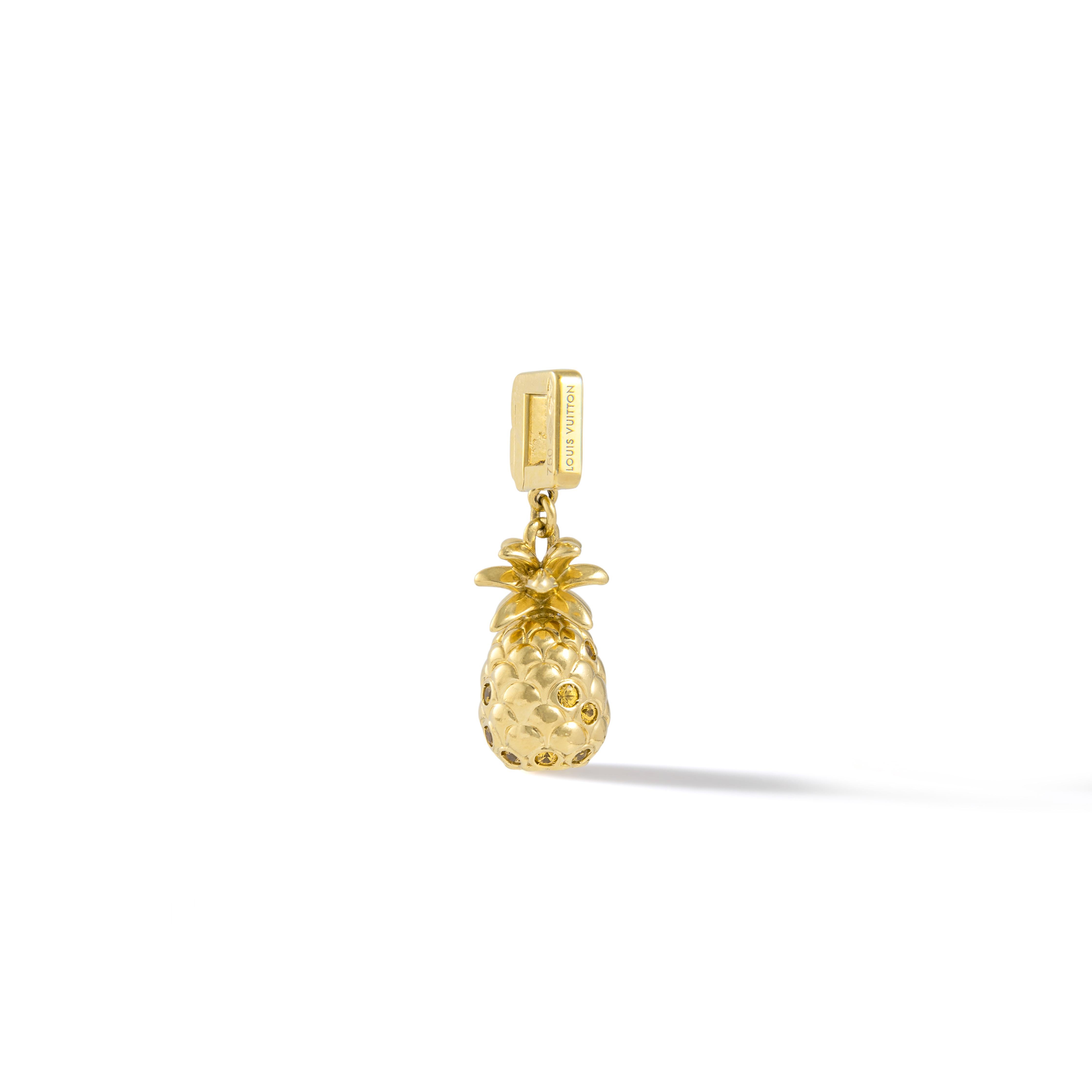  LOUIS VUITTON Pineapple motif Sapphire Pendant charm Yellow Gold 18K YG 750 90054084.
Yellow Sapphire.
Made in FRANCE. Signed Louis Vuitton, numbered and marked.

Total height: 1.38 inch (3.50 centimeters).