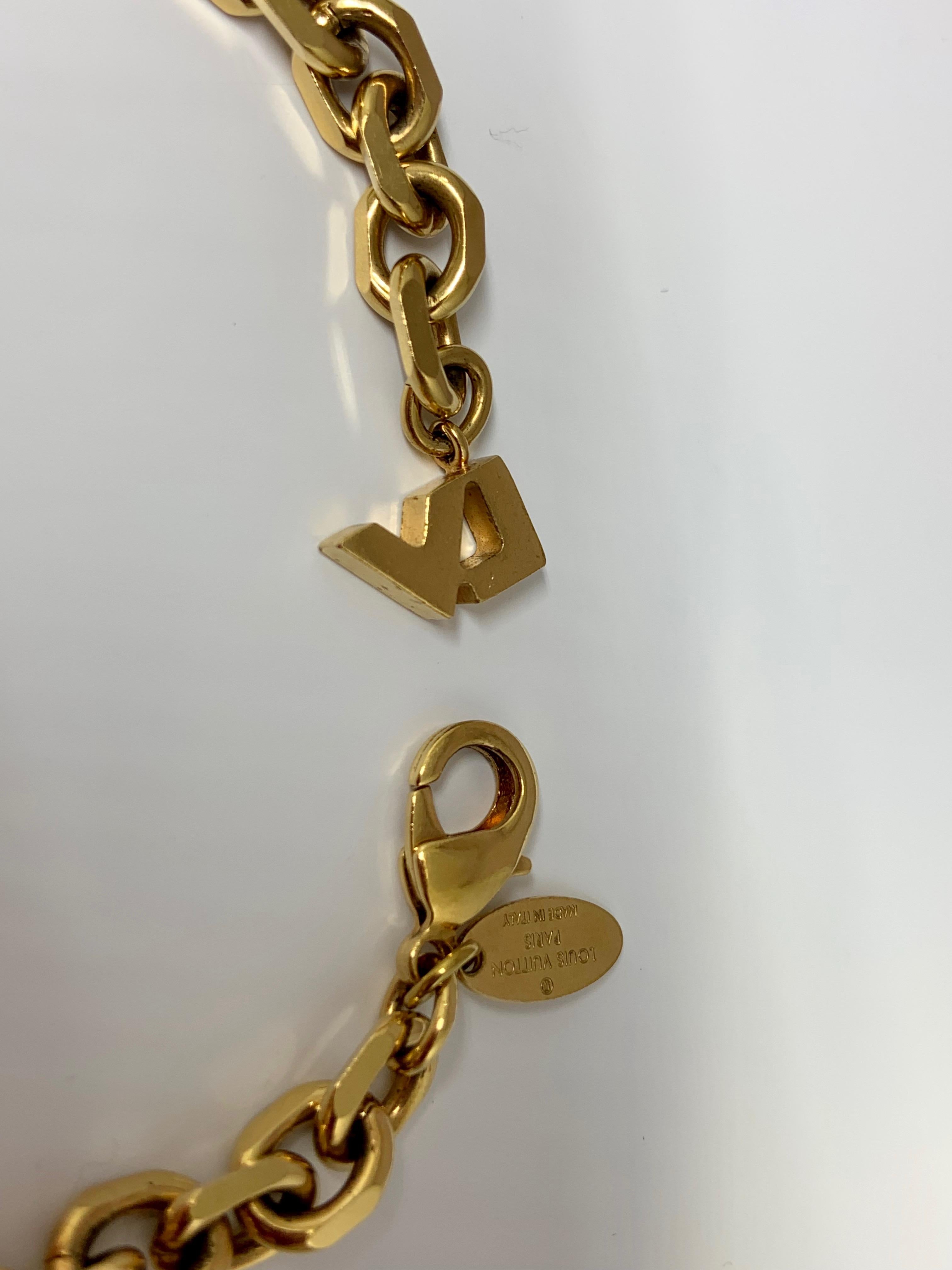 Louis Vuitton Gold-Plated Chain Link Charm Bracelet In Good Condition For Sale In Gainesville , FL