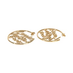 Louis Vuitton baño de oro  Pendientes de aro Script