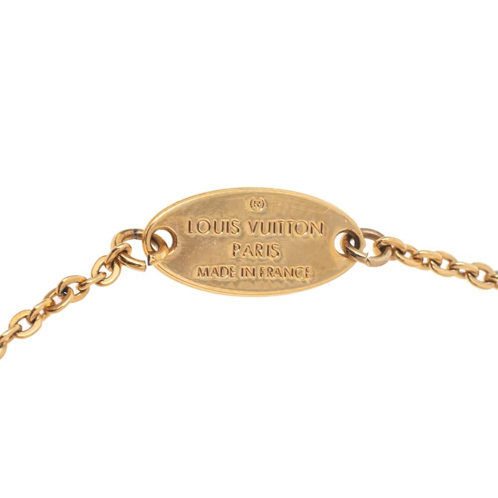 If you are looking for something not too loud yet statement-making, this Louis Vuitton bracelet is sure to win your heart. The creation is made from gold-tone metal with an embellished ladybug motif. It is held by a delicate chain that is secured
