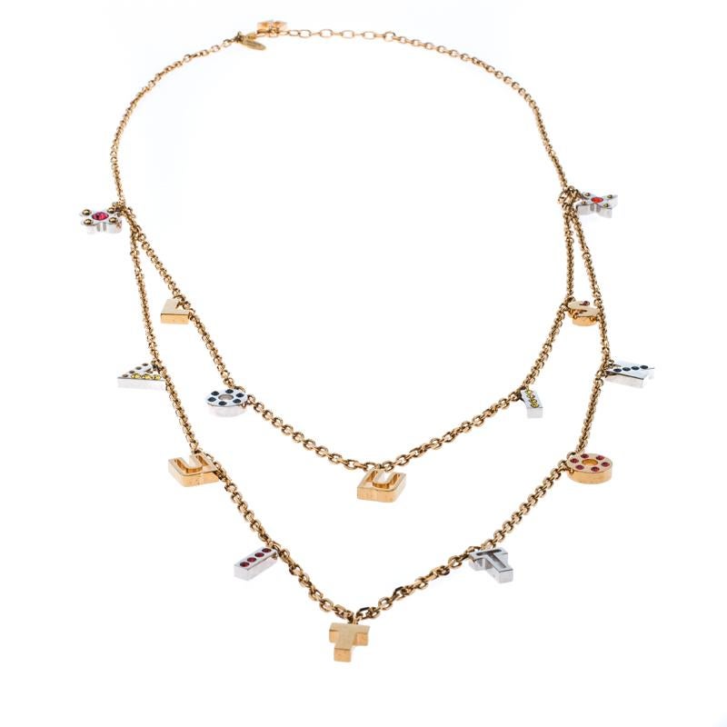 It is definitely Love At First Sight with this Louis Vuitton necklace. Beautifully designed with gold-tone metal, the piece has gorgeous layers of letters made from two-tone metal and set with crystals. The neckpiece is complete with a lobster