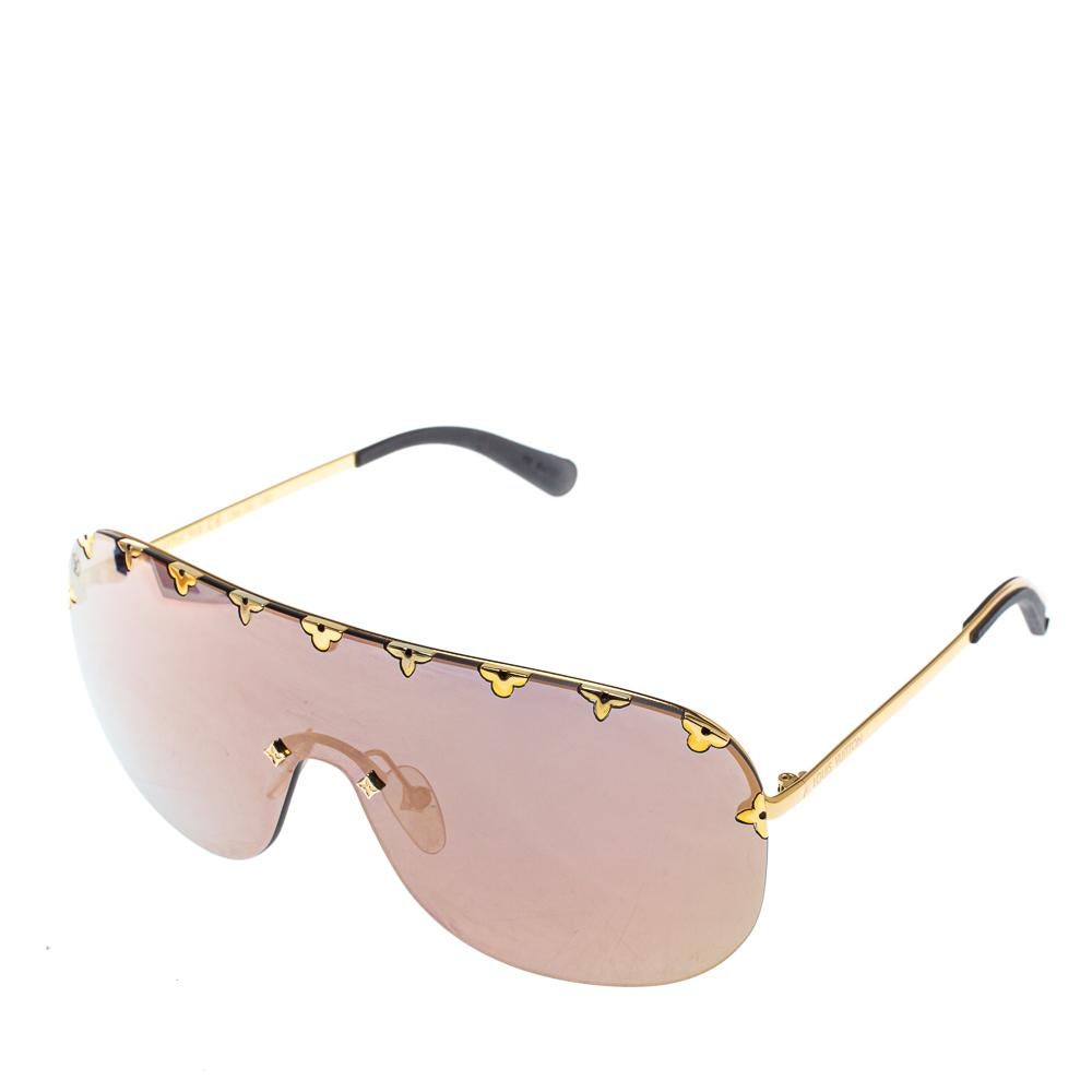 Don't limit your fashion sense to just your clothes, and shoes but let your accessories also help you make the right style statement. Choose creations like these sunglasses from Louis Vuitton to do just that for you. Set in a shield design, this