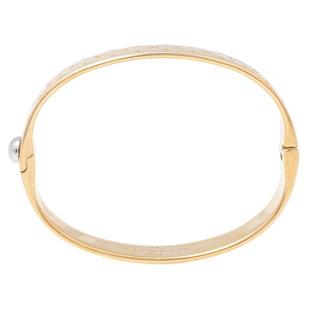 Bound to sit around your wrist and exude beauty, this Louis Vuitton is a great buy. It is made from gold-toned metal and engraved with the brand's signature monogram — a pattern well-known and loved by fashion lovers around the world. The bracelet