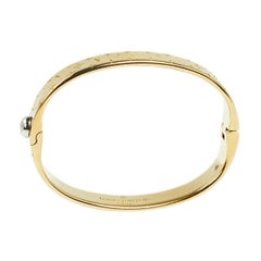 Louis Vuitton Gold Tone Nanogram Cuff Bracelet