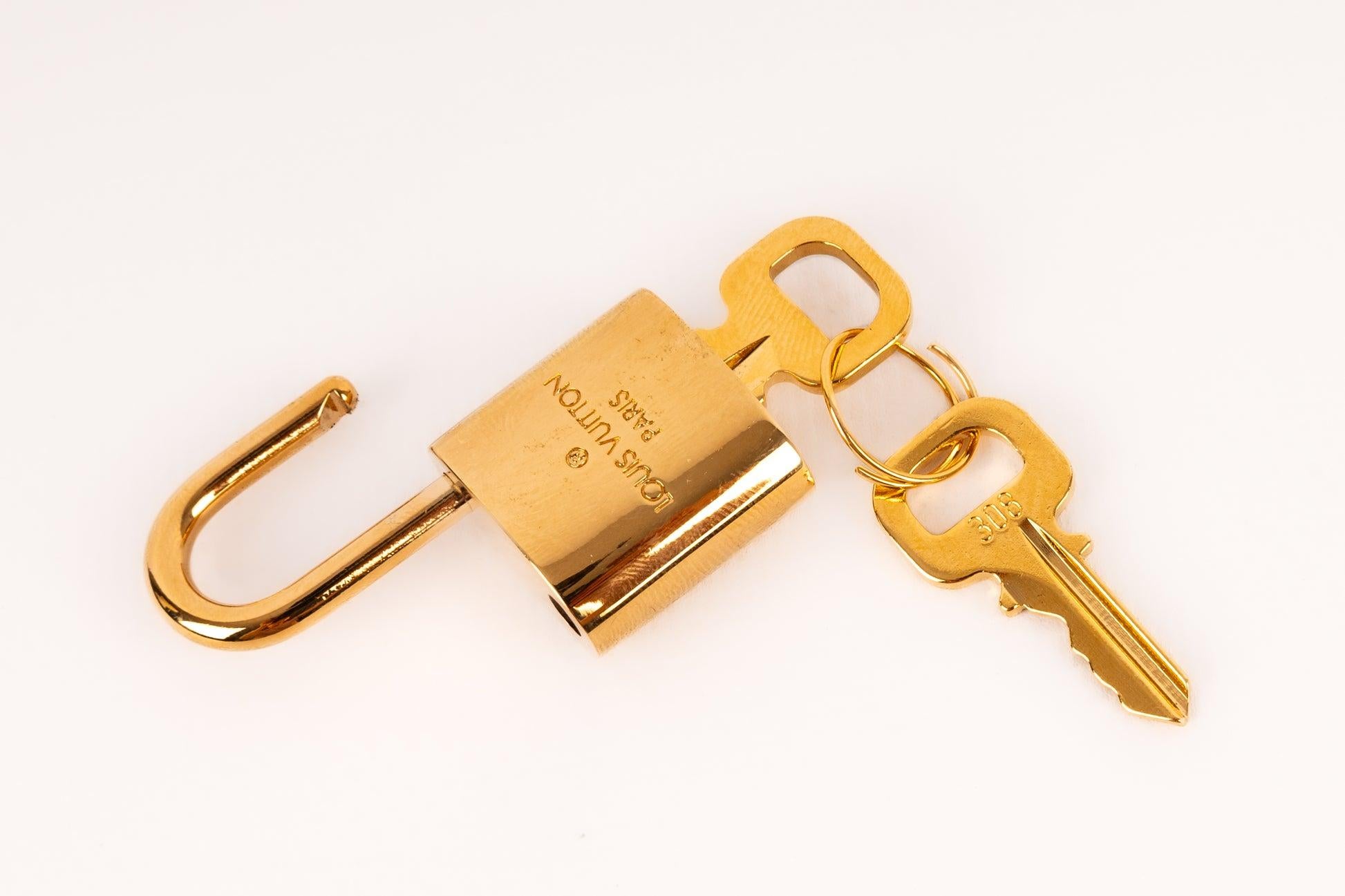 Women's Louis Vuitton Golden Padlock with Two Keys For Sale