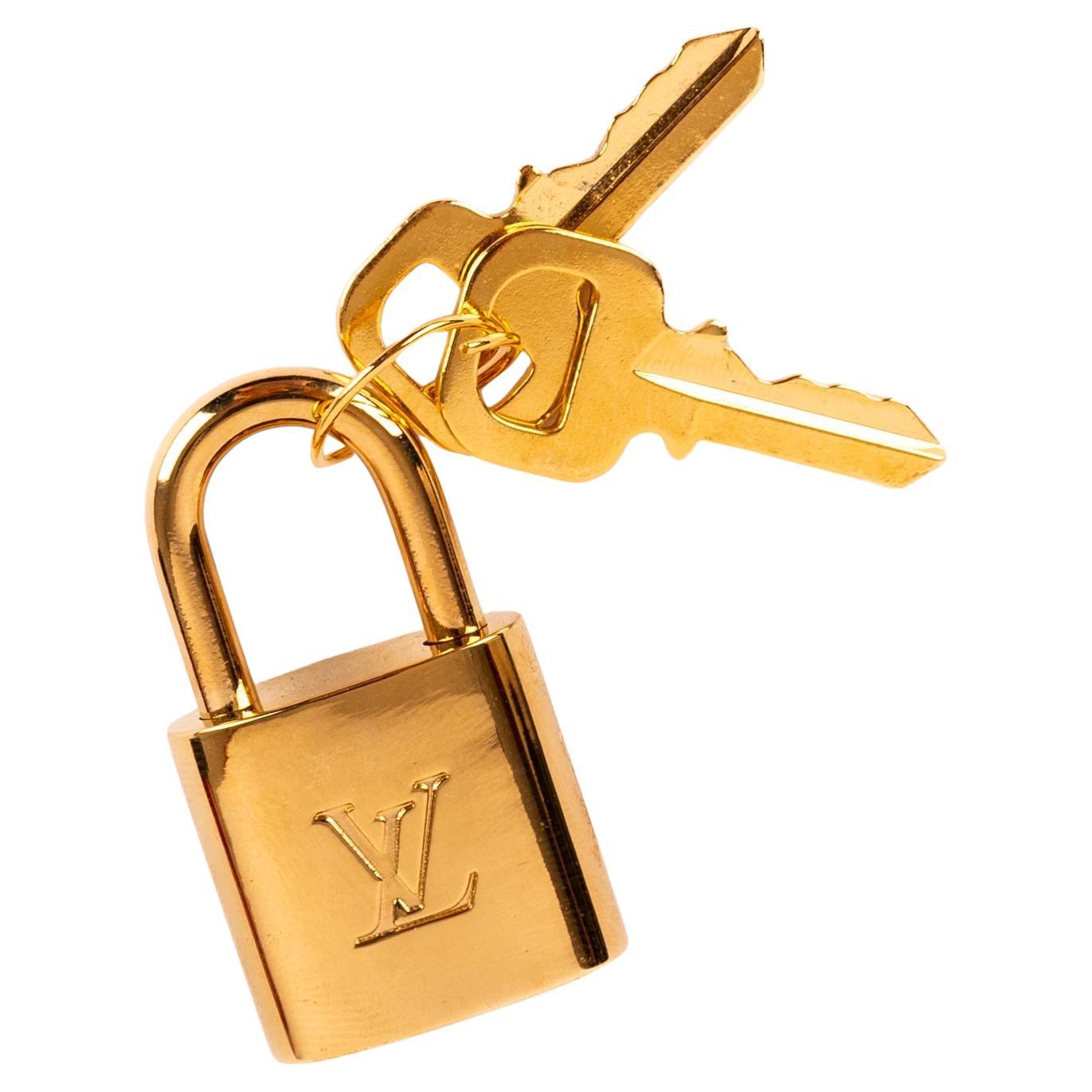 Lucchetto d'oro Louis Vuitton con due chiavi
