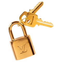 Goldenes Louis Vuitton-Taschenuhr mit zwei Schlüsseln