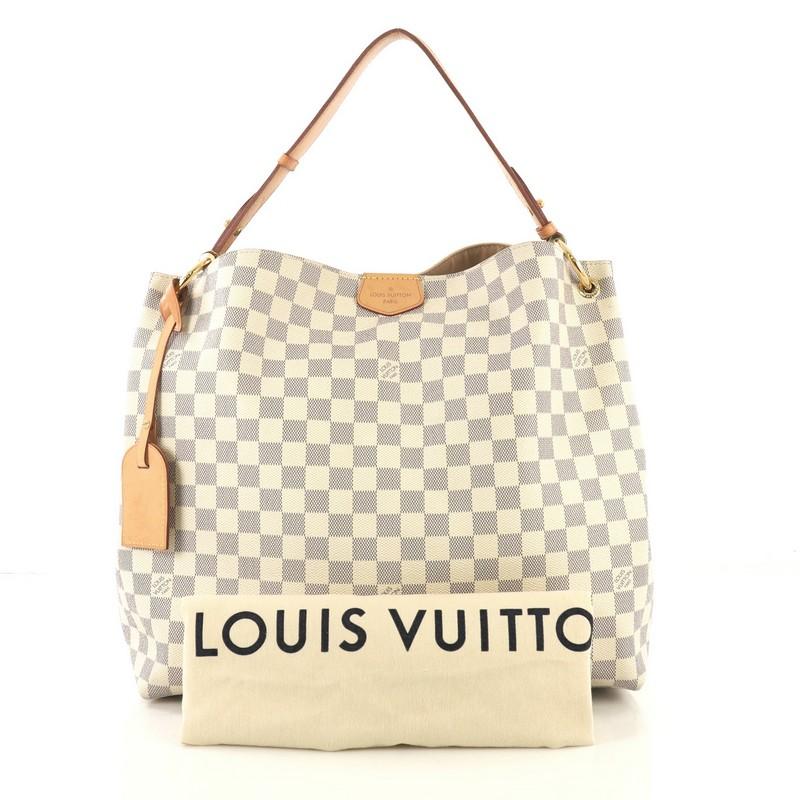 This Louis Vuitton Graceful Handbag Damier MM, crafted in damier azur coated canvas, features a flat leather shoulder strap and gold-tone hardware. Its magnetic closure opens to a beige fabric interior with zip pocket. Authenticity code reads: