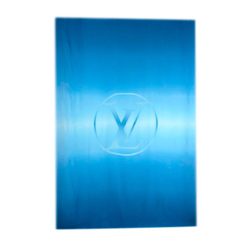 Louis Vuitton Gradient Blue LV Logo Wool Shawl
 

 - Wool shawl featuring gradient design in blue-tones
 - LV logo centre motif
 - Fringed hem
 

 Materials:
 100% Wool 
 

 Made in Italy
 Dry clean only
 

 PLEASE NOTE, THESE ITEMS ARE PRE-OWNED