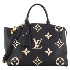 bicolor monogram empreinte leather handbags