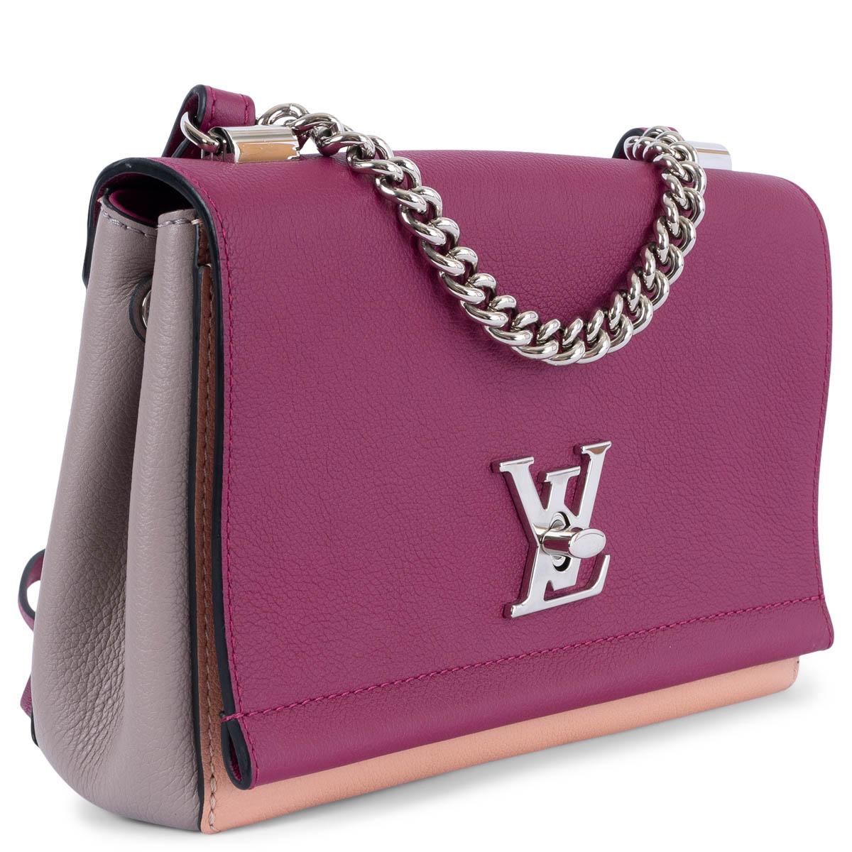 100% authentic Louis Vuitton Lockme II BB Chain Bag in Grape Venus (purple, coral and taupe) calfskin. The design features a silver chain top handle and an optional purple leather crossbody strap with added shoulder pad. The crossover flap opens