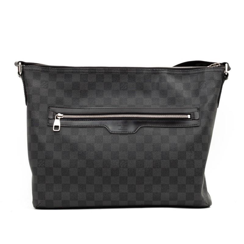 Unisex. Nick occasion bag from Louis Vuitton in blue and black gray graphite coated canvas. The jewelry is palladium silver with a zipper. It is lined in black fabric with small flat pockets and two pockets for pens. On the front of the bag a large