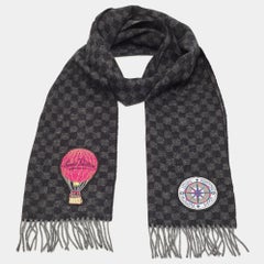 Pale pink and rose gold Louis Vuitton Logomania wool scarf with monogram  pattern throughout and fringe edges.