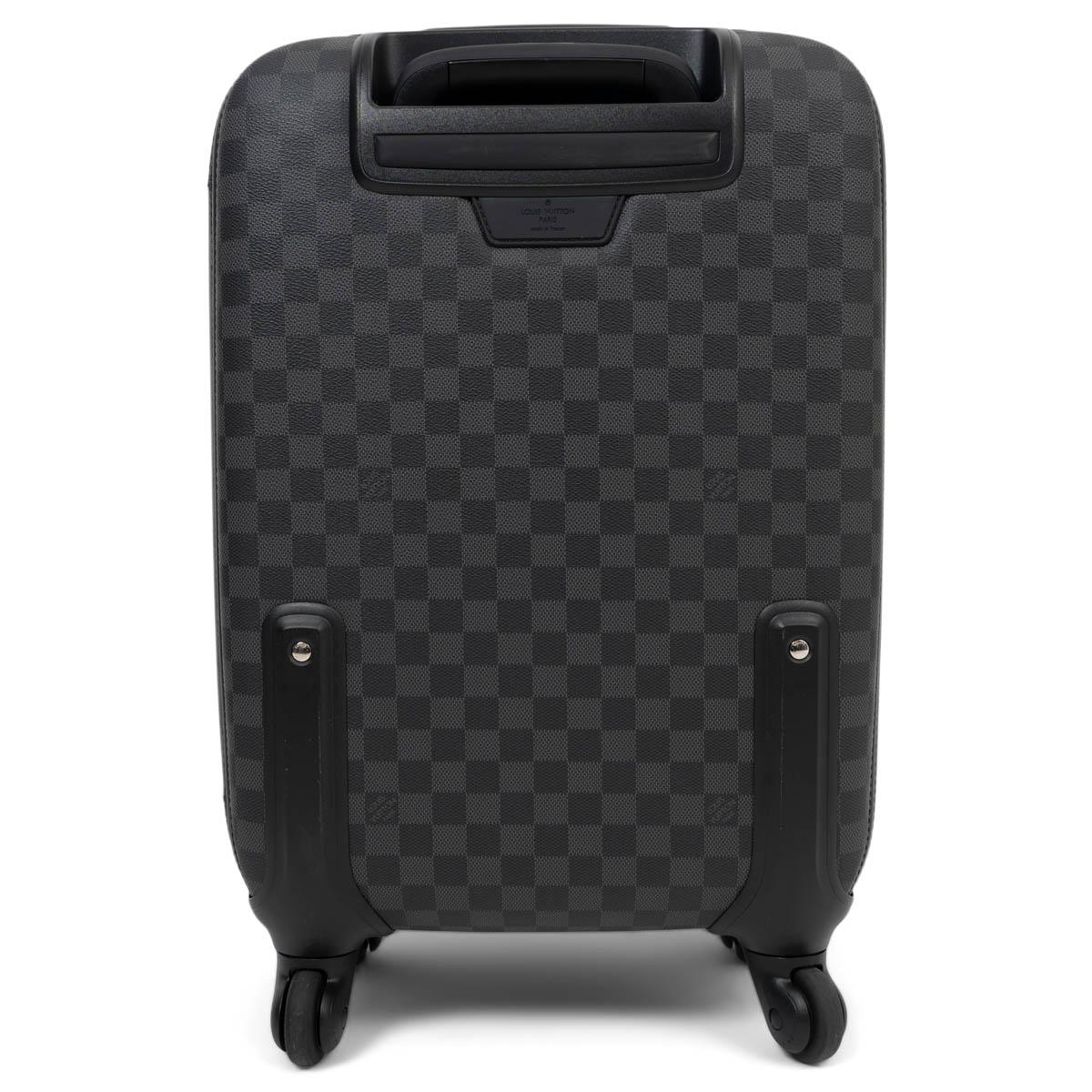 100% authentic Louis Vuitton Zephyr 55 trolley case in Graphite Damier Canvas with leather trim. The Zephyr rolling suitcase has silent wheels that twist and turn on four multi-directional wheels, letting you travel in ease as well as style. 1