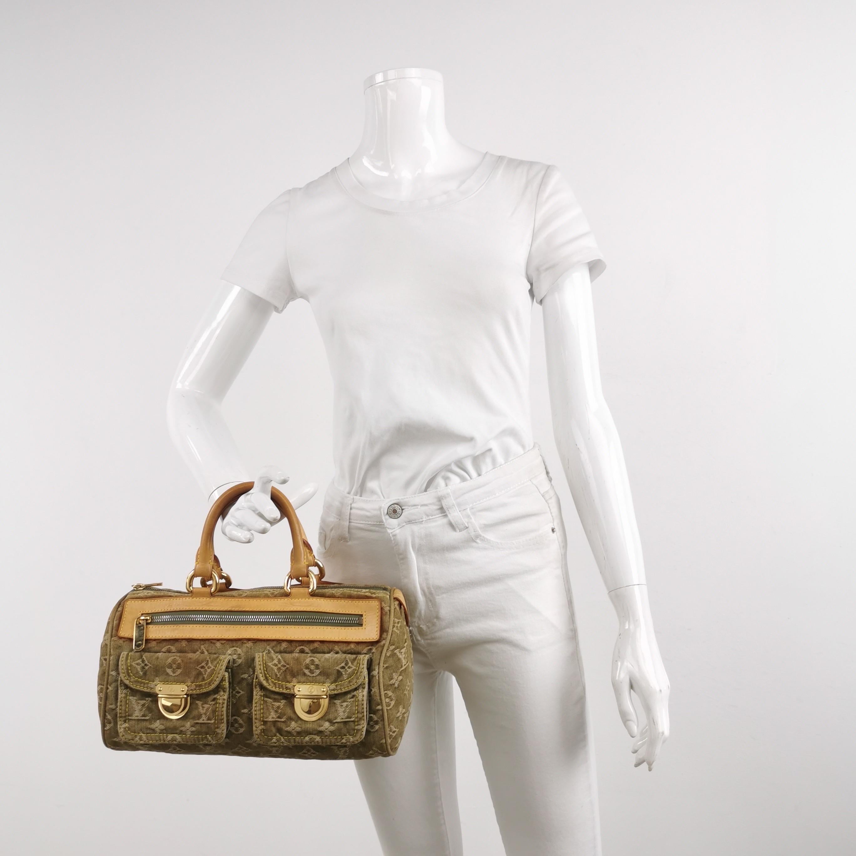 Louis Vuitton Denim Neo Speedy Boston Bag
 These are professional photos of the actual bag.
 Light wash blue monogram denim Louis Vuitton Neo Speedy with brass hardware, tan vachetta leather trim, dual rolled top handles, three exterior pockets; one