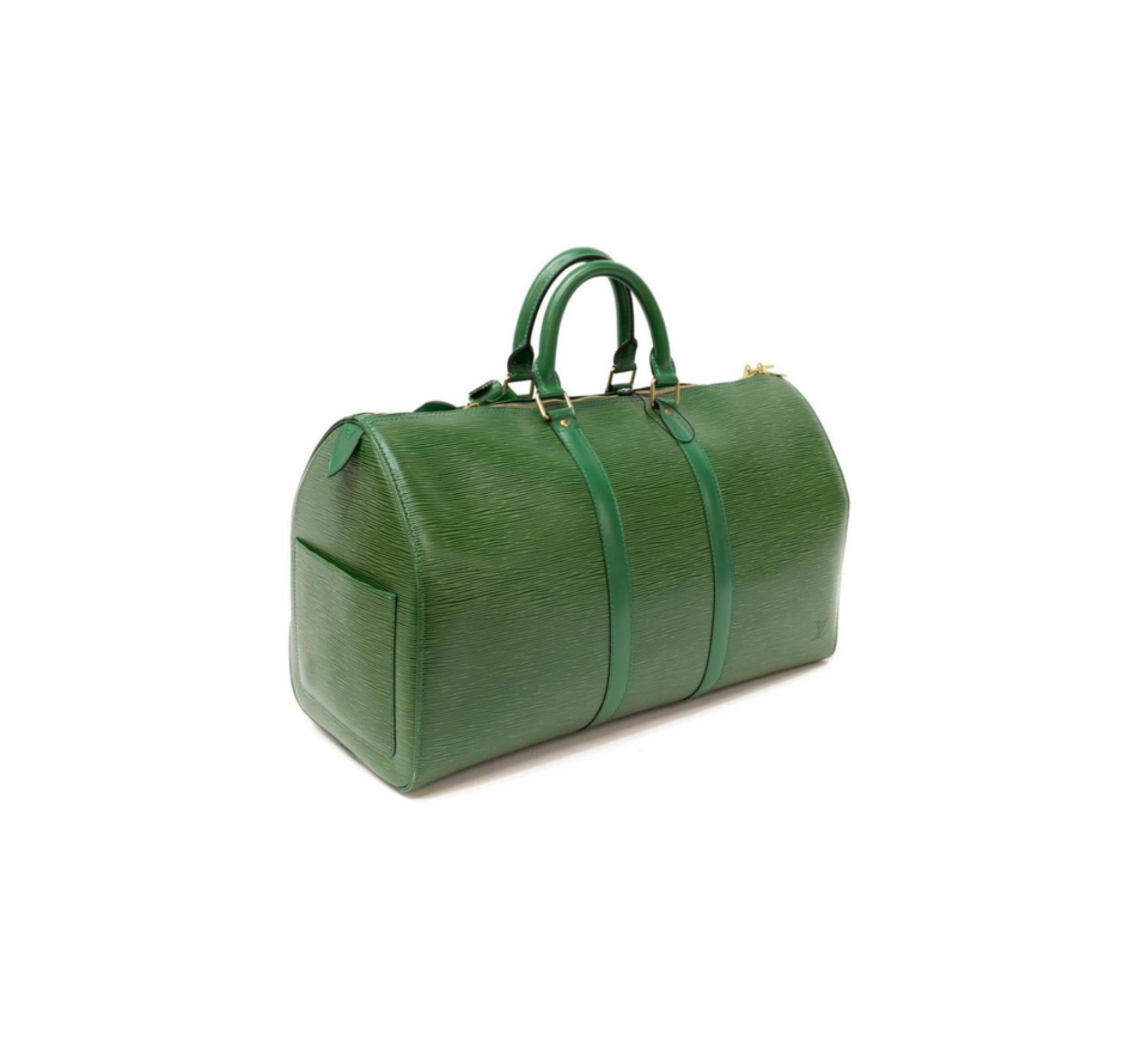 Louis Vuitton Green Epi Leather Borneo Keepall 45 Duffle Bag 853599
Width (inch) : 17.7 inch(approx)
Width (cm) : 45 cm(approx)
Height (inch) : 10.6 inch(approx)
Height (cm) : 27 cm(approx)
Depth (inch) : 7.87 inch(approx)
Depth (cm) : 20