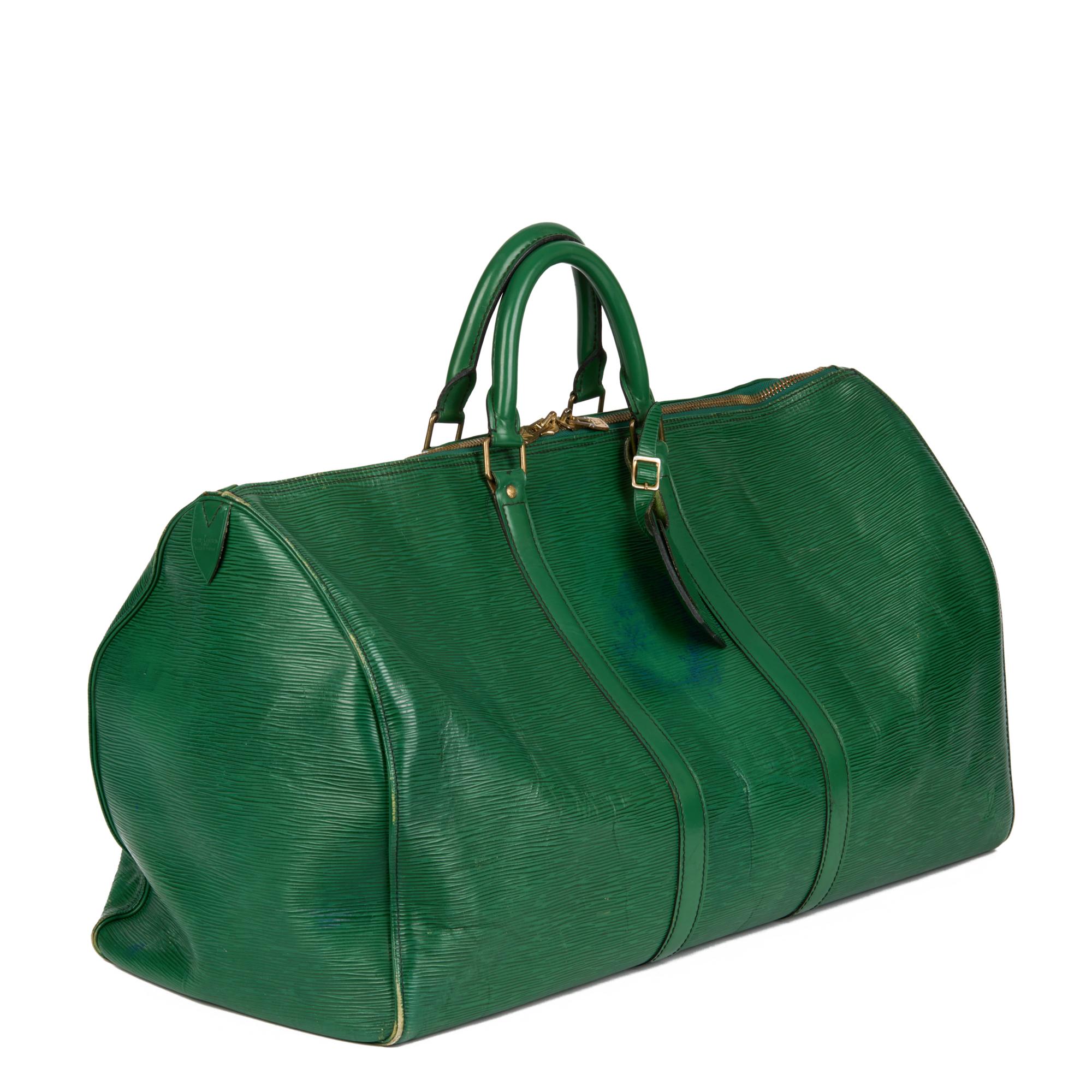 LOUIS VUITTON
Green Epi Leather Vintage Keepall 55

Xupes Reference: CB623
Serial Number: VI8901
Age (Circa): 1991
Authenticity Details: Date Stamp (Made in France)
Gender: Unisex
Type: Travel

Colour: Green
Hardware: Golden Brass
Material(s): Epi