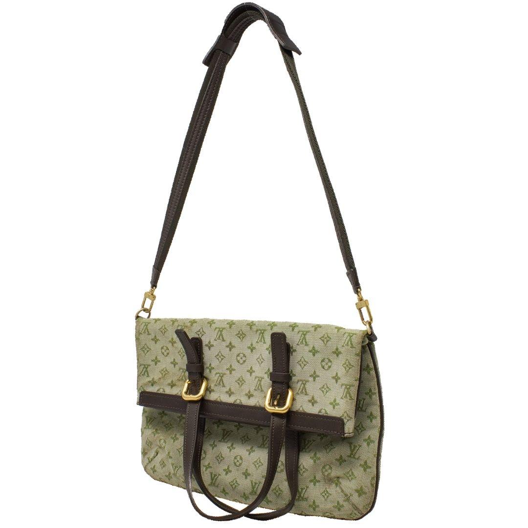 Funky convertible LV that can be worn multiple ways depending on the look your'e going for and how much you have to carry. Crafted in green mini lin, with bass hardware, where as a tote with the flat handles, or as a tote bag with the single