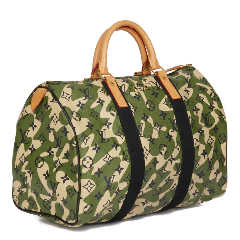 LOUIS VUITTON
Green Monogramouflage Coated Canvas & Vachetta Leather Murakami Speedy 35

Xupes Reference: HB4441
Serial Number: AA2008
Age (Circa): 2008
Accompanied By: Padlock
Authenticity Details: Date Stamp (Made in France)
Gender: Ladies
Type:
