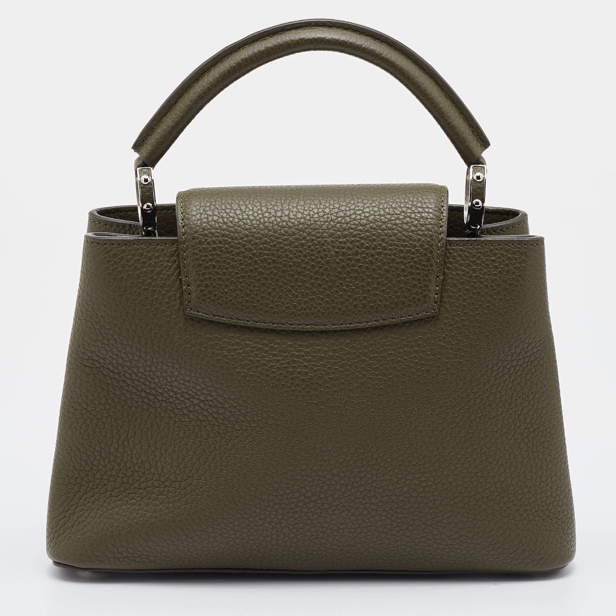 Crafted from leather, this LV Capucines BB features a structured design with a single handle and protective metal feet. While the front LV elevates its beauty, the leather interior will dutifully hold all your daily essentials.

Includes: Original