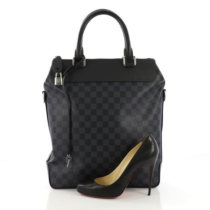 This Louis Vuitton Greenwich Tote Damier Cobalt, crafted in damier cobalt coated canvas, features dual rolled leather handles, black leather trim, exterior zip pocket, and silver-tone hardware. Its zip closure opens to a navy microfiber interior