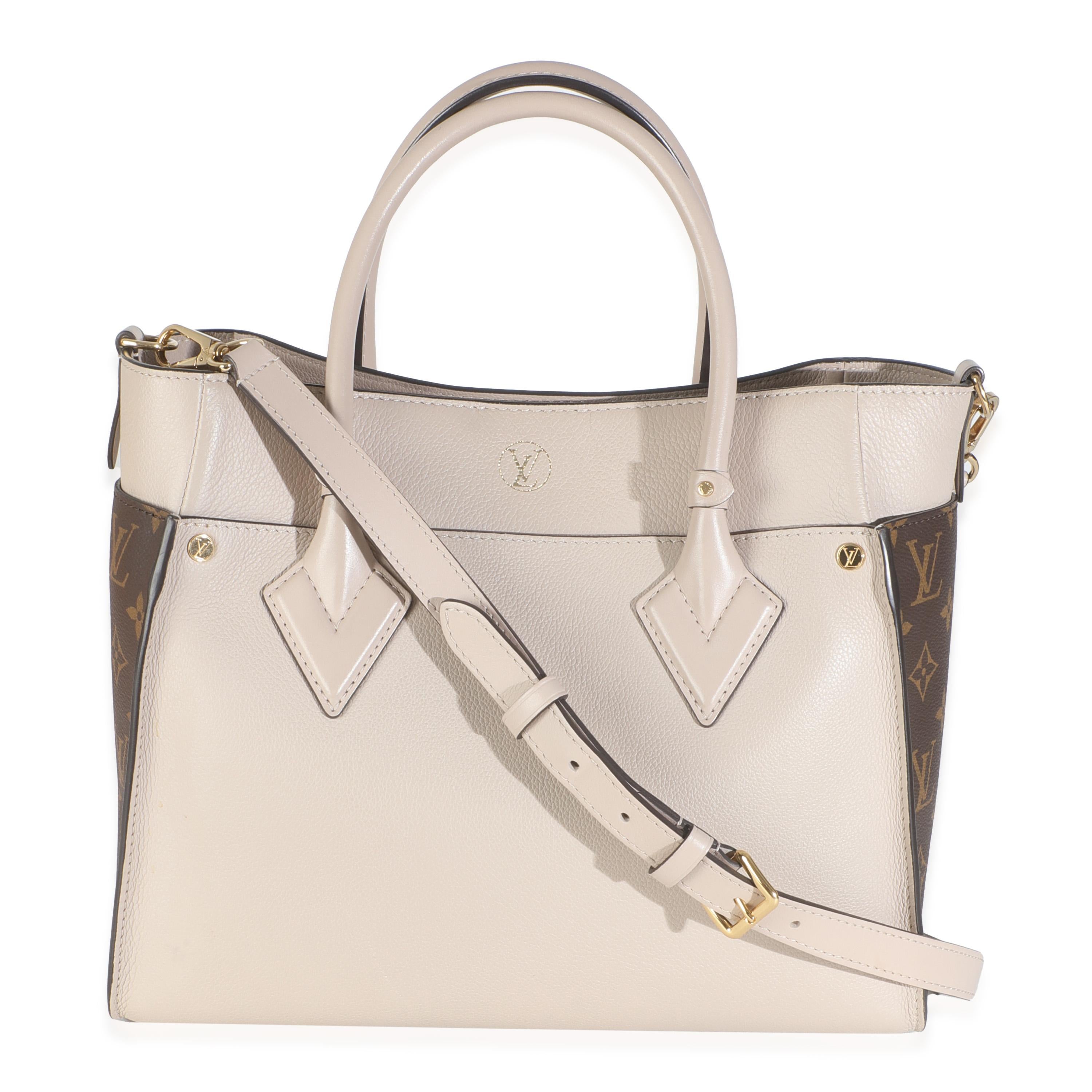 Listing Title: Louis Vuitton Greige Calfskin Monogram On My Side MM
SKU: 145874
MSRP: 4950.00 USD
Condition: Pre-owned 
Condition Description: This bag says it all. The Onthego bag from Louis Vuitton is designed for busy lifestyles. Topped with two
