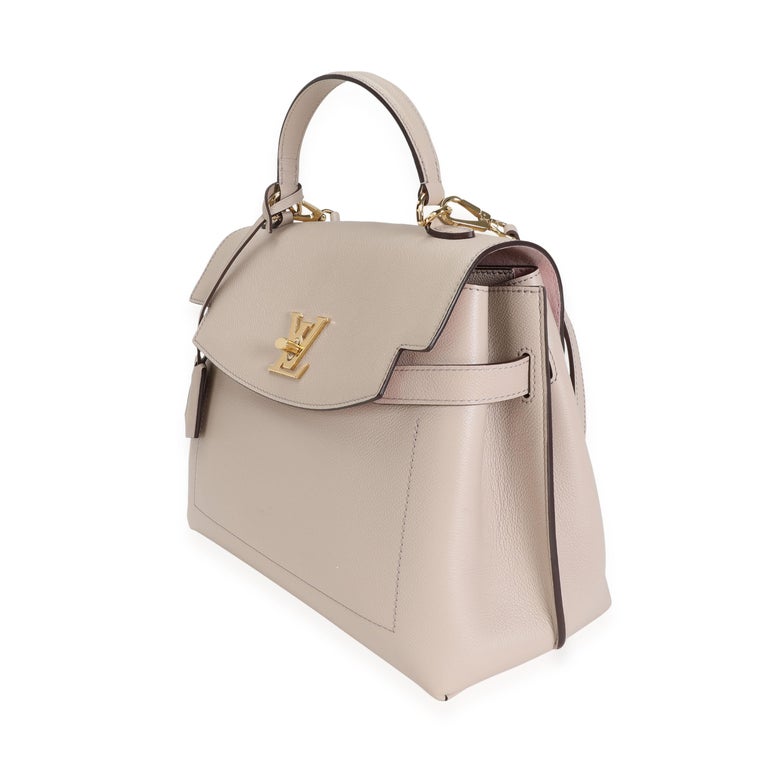 Louis Vuitton Greige Soft Calfskin Lockme Ever MM In Excellent Condition For Sale In New York, NY
