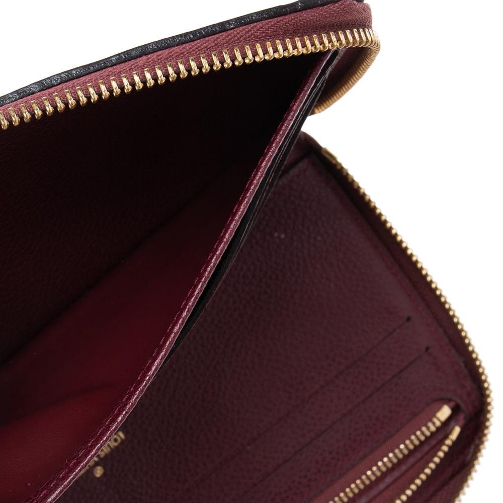 Women's Louis Vuitton Grenat Monogram Empreinte Leather Secret Continental Wallet