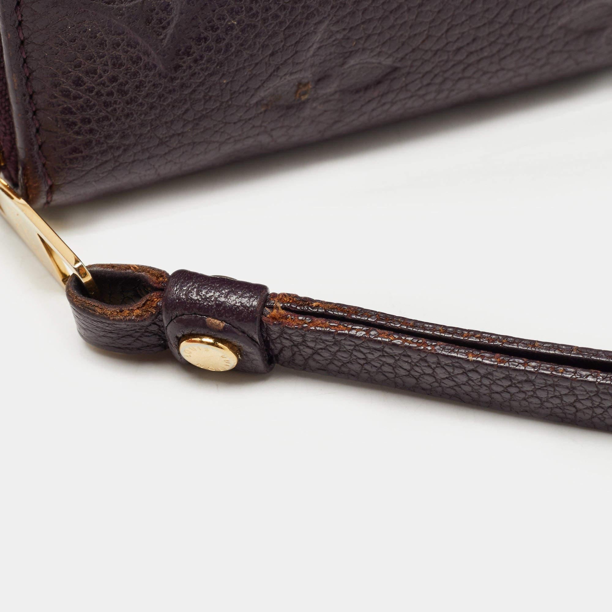Women's Louis Vuitton Grenat Monogram Empreinte Leather Zippy Wallet